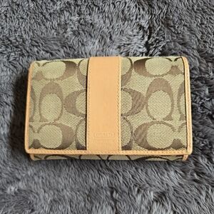 Coach Signature Canvas Trifold Wallet in Brown and Tan